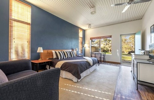 Armagh House | Tranquil motel style large room.