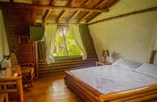Montanita Cottage | Tranquil Oasis-Bed,1 Bath Cottage with Pool View and AC - Your Perfect Getaway!