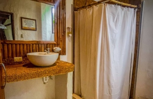 Montanita Cottage | Tranquil Oasis-Bed,1 Bath Cottage with Pool View and AC - Your Perfect Getaway!