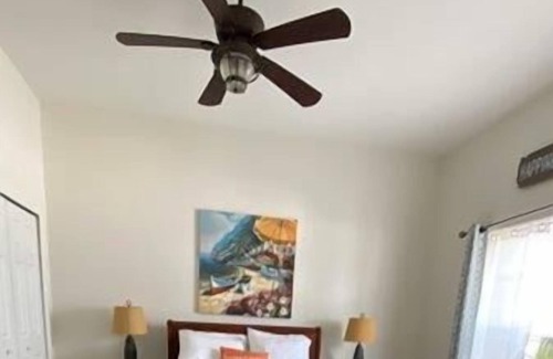 Sunset Pass Villa | Tranquil Retreat: Walk Out to Banana Bay White Sand Beach on the Intracoastal