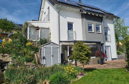 Oberzissen Apartment | Traumhaftes und Entspanntes Wohnen am Gartenteich