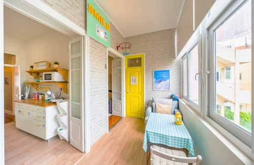 Penha de Franca Apartment | Travel Themed Home | Office Balcony Loft