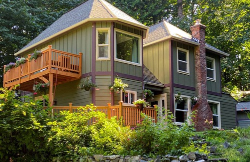 Burley House | Tree-lined home with firepit, grill, balcony, & wood-burning fireplace - dogs ok