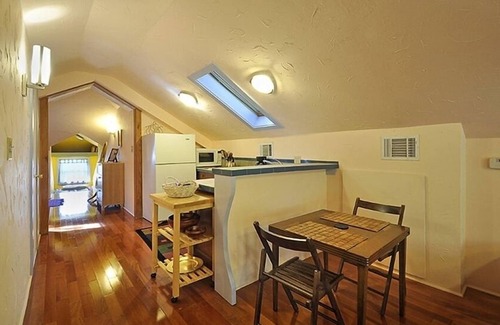 Holly Apartment | Treehouse Apt, Cute Converted Attic Apt. Above a House near Downtown