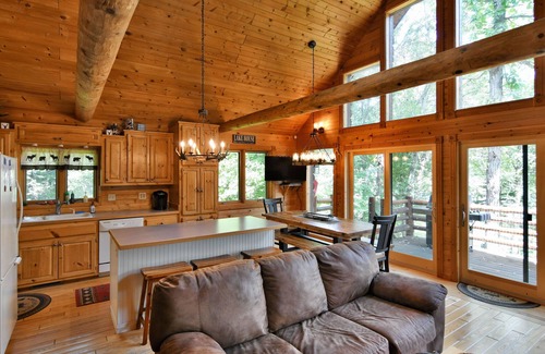 Trego House | Trego Lake House- Level elevation to the water's edge.