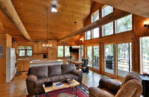 Trego House | Trego Lake House- Level elevation to the water's edge.