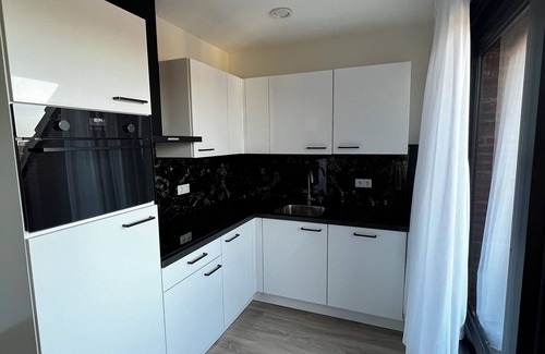 Goirle Apartment | Trendy and cozy stay with parking, WiFi, and modern comforts near cafes and shops. Sleeps four.