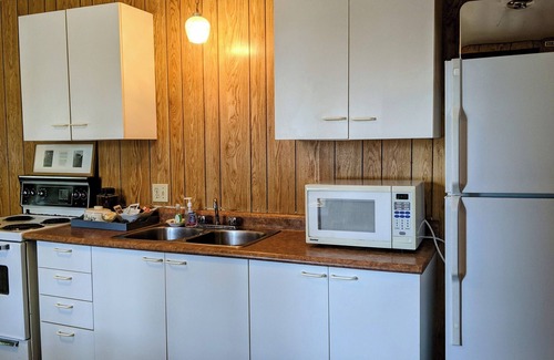 Nipissing Cottage | Trendy, Mid-Century Styled Cottage on Sand Beach