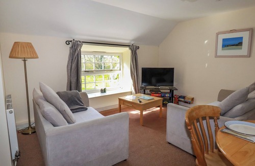 Newquay Cottage | TREVARTHIAN FARM (ANNEX), pet friendly, with a garden in