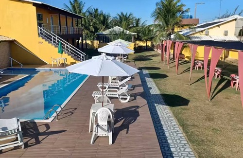 Barra Nova Apartment | Triple room with air conditioning and hammock on the balcony