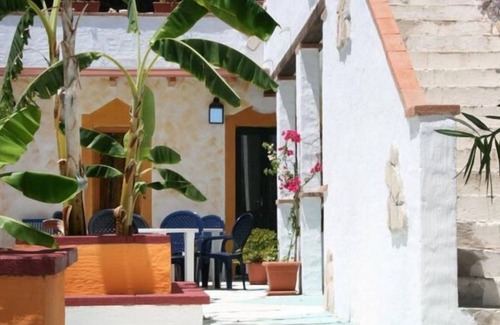 Gonnesa Apartment | Triple room with shared pool and kitchen, Wi-Fi and air conditioning