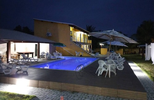 Barra Nova Apartment | Triple suite with air conditioning, TV, minibar and private balcony with hammock