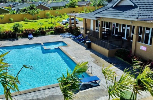 Falmouth House | Tropical Escape, Spacious 2 Bedroom Vacation Oasis with WiFi, AC