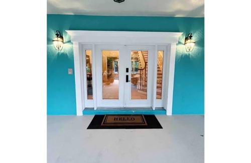 Palm City House | Tropic Retreat! Pool, 3 acres, pond, 4500sq ft