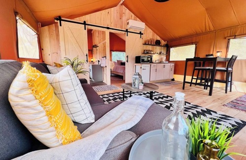 Riverview Estates Cabin | Tropical Glamping with Hot Tub