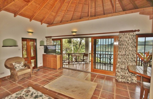 Friendship Bay Cottage | Tropical Hideaway Palm Cottage - Stunning Views - 5* Boutique Accommodation