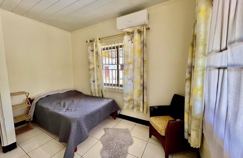 Paramaribo Apartment | Tropical Paradise in Paramaribo 3 - Room House