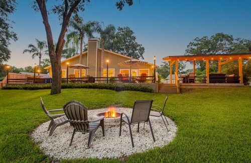 Rustic Oaks House | Tropical Retreat near beaches with amazing Pool, Cabana, Hot Tub & Patio areas!
