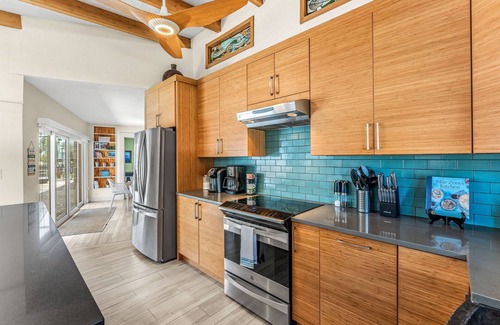 Cocoa Beach House | 🌴 Tropical Riverfront Retreat w/Heated Pool, Spa, Tiki Hut & Dock!