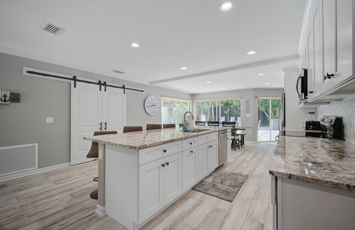 Bay Isle House | Tropical Siesta Key Home with Incredible Pool, Hot Tub, and Patio!