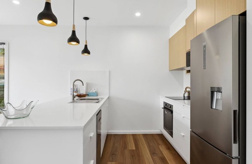 Woolgoolga House | Tucked away but central to shops, restaurants, cafes, pub, clubs, is our modern contemporary house.