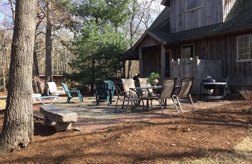 East Falmouth House | Tucked away in a private wooded setting