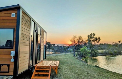 Burrum River House | Turtle Island Lakeside Tiny House 1 by Tiny Away