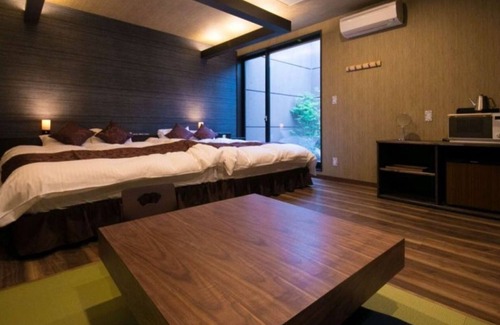 Oita Hotel | Twin beds tatami onsen openair jacuzzi bath/Oita Ōita