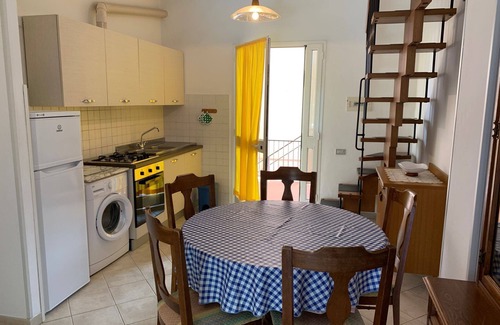 Ronchi Apartment | Two bedroom apartment with verandah, 100m from the beach. Free WiFi.