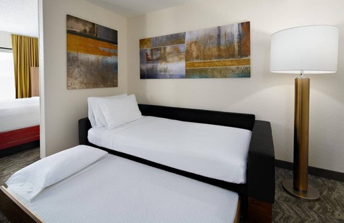 Southeast Houston Hotel | Two Family Ready Rooms w/Living Area, Pool, and Daily Free Breakfast