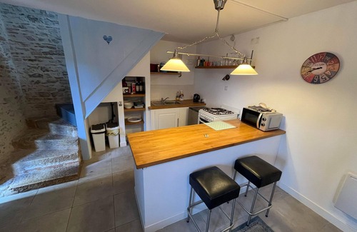 Bazoges-en-Pareds Cottage | Two gites located side by side in a medieval village with heated pool.