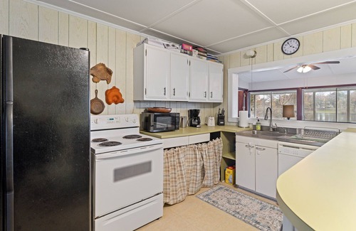 Acme House | TWO homes on Black River Lake with TWO boat slips!