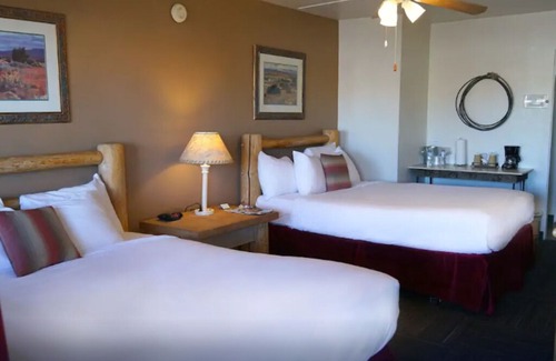 Camp Verde Cabin | Two Queen Suite 114 in Fort Verde Suites