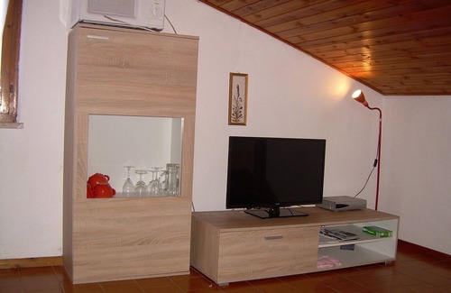 Castelletto Apartment | Two-room attic apartment in Mary House with balcony and garden and lake view