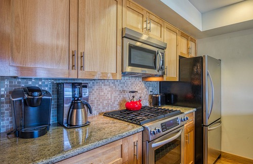 Tahoe Keys Condo | Two-story lakefront condo with access to dock, hot tub, pool & tennis