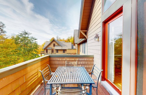 Proctorsville Condo | Two-story townhome with forest/mountain view, gas fireplace, pool, gym & saunas