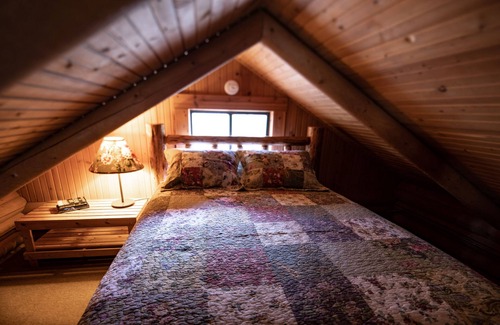 Bigfork Cabin | Two-story woodland cabin with firepit, near Flathead Lake & Glacier