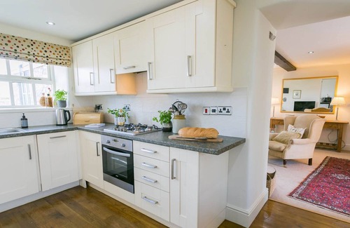 Pentraeth Cottage | Ty Gwair - a cosy fire that sleeps 4 guests in 2 bedrooms