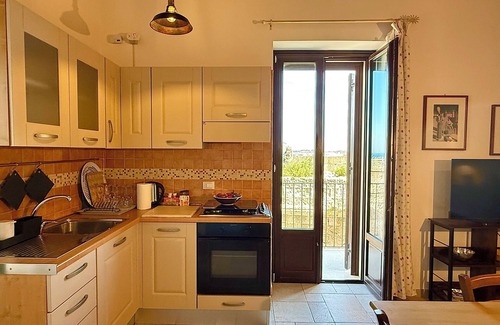 Centro Storico Apartment | Typical house with terrazzo overhanging seen sea