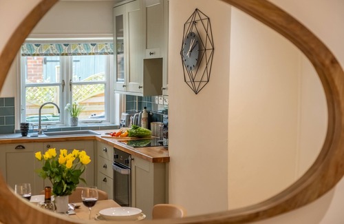 Helhoughton Apartment | Typical Norfolk brick and flint character cottage which is cosy and comfortable