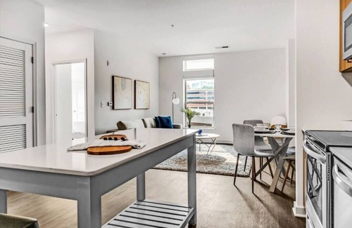 McLean Apartment | "Tysons' Blue-Gray Haven Stylish 2BR with Amenities + Huddle Rooms + Pool/Gym