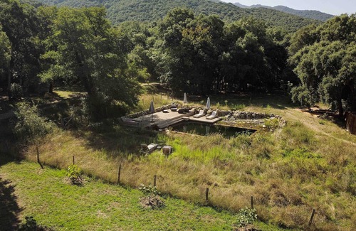 Petreto-Bicchisano House | U Pratu, Bungalows surrounded by nature, natural swimming pool and organic garden - Vignola