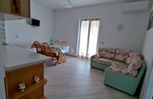 Camporotondo Other | Uliveto farm house Oleander with porch and view of the valley