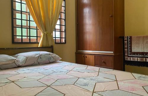 Kampung Banggul Peradung House | UMMI HOMESTAY Manir KT