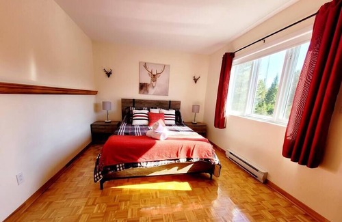 Chertsey Ski Chalet | Un coin tranquille au bord de la rivière Ouareau