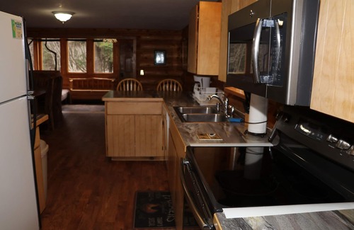 Anchor Point House | Unique Alaskan log home in trees & wild flowers on 14-acre private homestead.