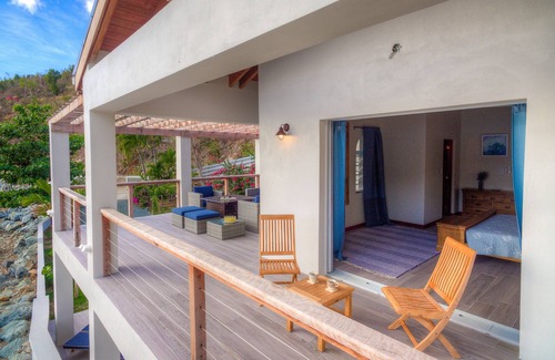 Brewers Bay House | Unique beach front property steps away from the beautiful waters of brewers bay.