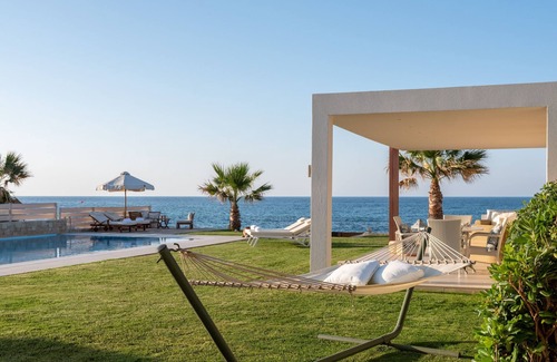 Hersonissos Centre Villa | Unique beachfront location, heated pool with built-in hydromassage, large garden