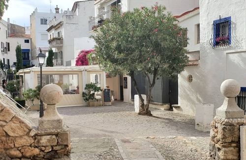 Sitges Apartment | Unique, Designer owned apartment steps from the beach and the history of Sitges
