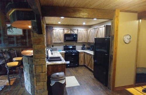 Muse Cabin | Unique Log House nestled in the woods near Billy Creek.